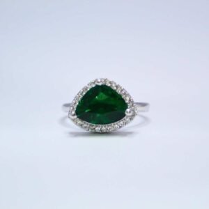 Elegant Emerald Green Trillion Cut Silver Ring with Diamond Accents