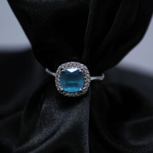 Cushion-Cut Azure Sky Blue Ring with Radiant Halo sparkling accents