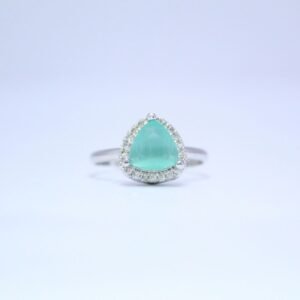 1 Trillion-Cut Aqua AD Ring with a Halo of Dazzling Accents