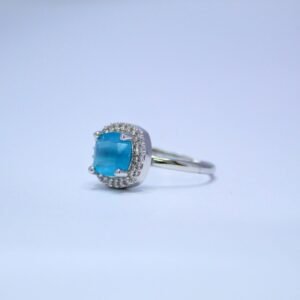 Cushion-Cut Azure Sky Blue Ring with Radiant Halo sparkling accents