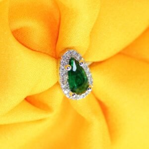 Radiant Pear Cut Emerald Green Accent Ring with a Sparkling Halo of Brilliance