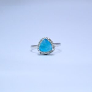 Ring with Serene Larimar Sky Blue Trillion Cut Accent and Dazzling Halo