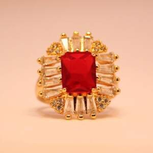 Red Radiance Ring with Emerald-Cut Centerpiece and Dazzling Baguette Halo