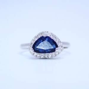Trillion-Cut Midnight Blue Ring with Dazzling Halo
