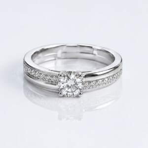 timeless solitaire ring with a pavé-accented band