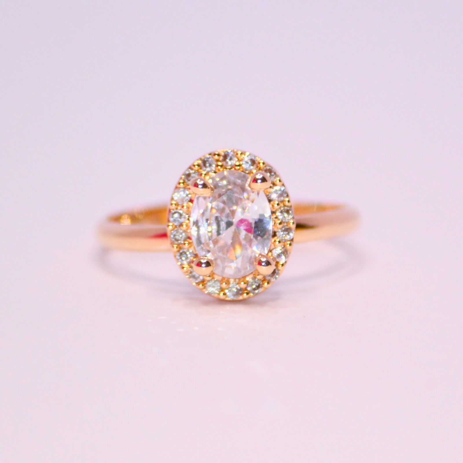 Graceful-Oval-Cut-Halo-Ring-in-Warm-Gold-4