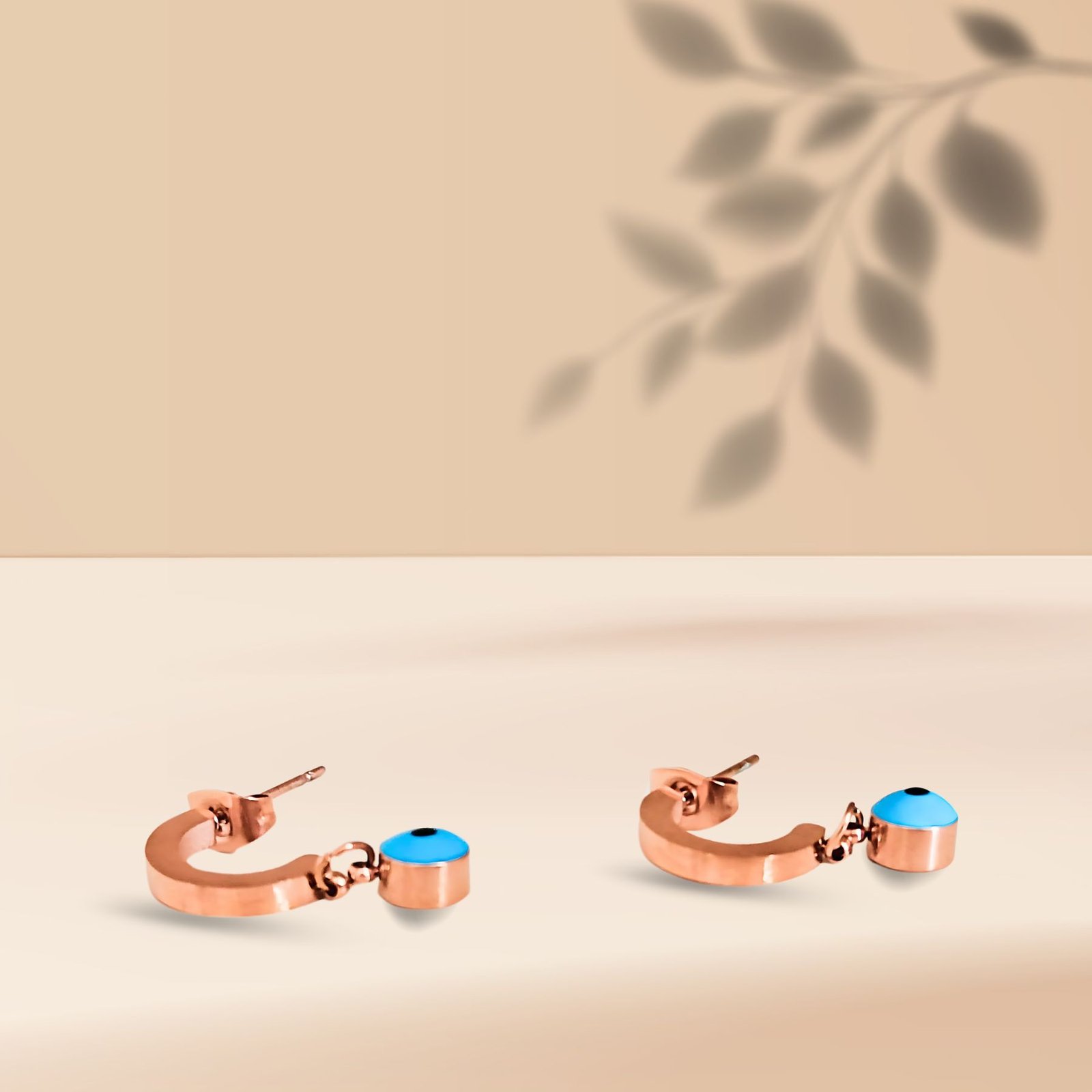Rose-Gold-Evil-Eye-Charm-Hoop-Earrings-–-Protection-Elegance